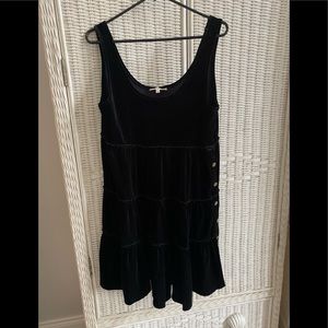 Velvet jumper with gold button detailing down the side. Brand new without tags.